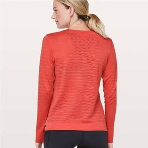 Lululemon size 4 orange shirt